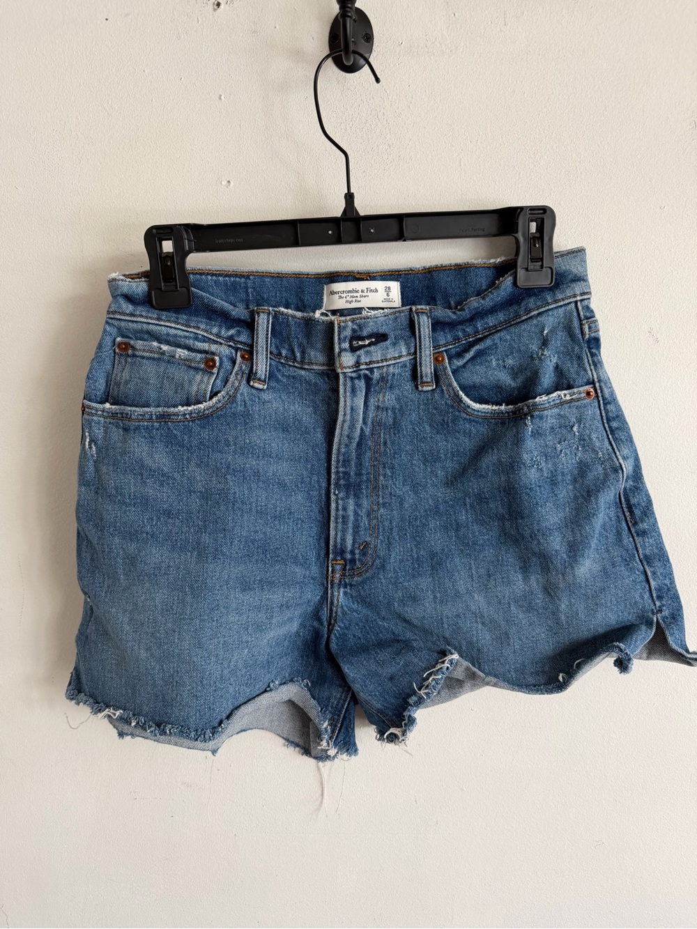 High-Rise Distressed Blue Denim Cutoff Shorts
